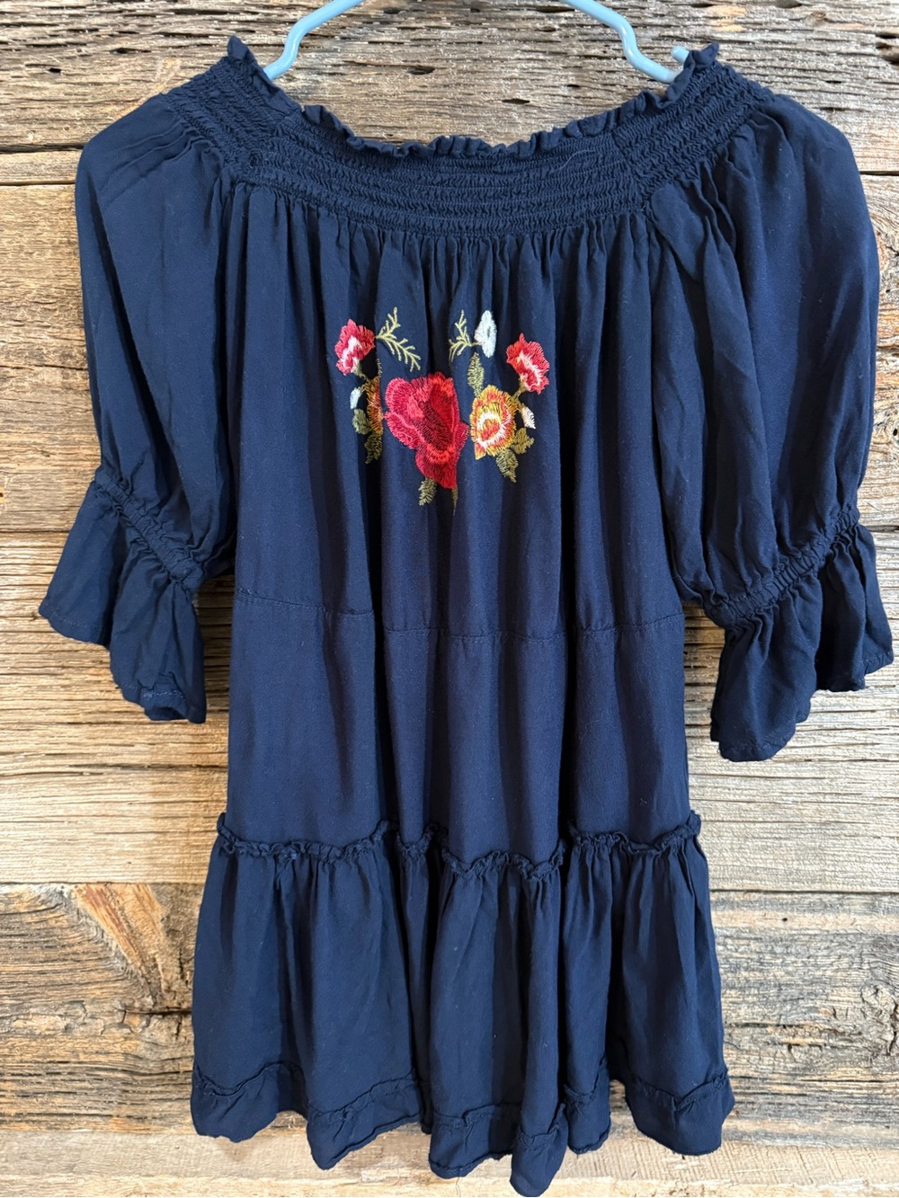 feathers Navy Embroidered Floral Off-Shoulder Blouse.  


B11